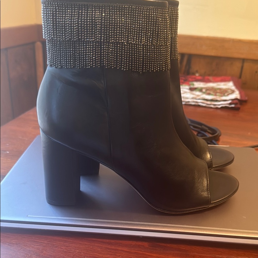 Black peep toe booties with black fringes size 8.5 leather